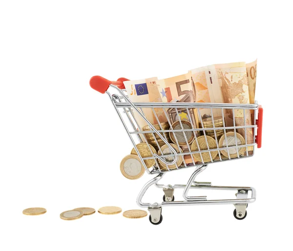 Euro notes and coins in a shopping cart — Stock Photo, Image