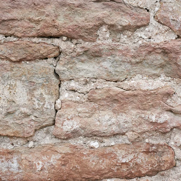 Frammento di muro del vecchio castello di mattoni — Foto Stock