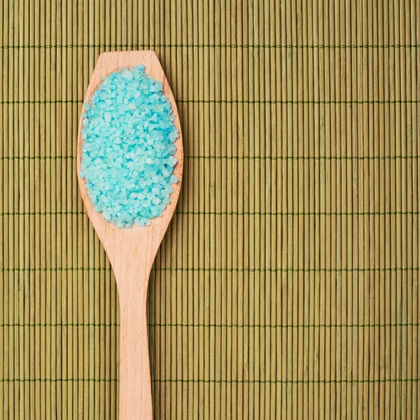 Wooden spoon full of aromatic salt — Stock Photo, Image