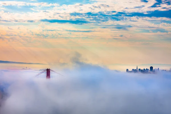 World Famous Golden Gate Bridge Surrounded by Fog after Sunrise in San Francisco,Californiaa — Stock Photo, Image