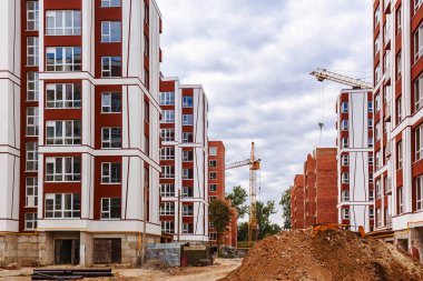 Crane and building cranes in the city. construction site concept.