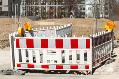 Road Repair. Road works traffic sign at the city street, stop sign! Road under construction. Repair Asphalt Road Closed by Road Barricade