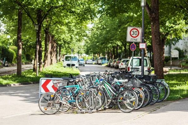 Bicycle Parking Green Street Cars — Zdjęcie stockowe