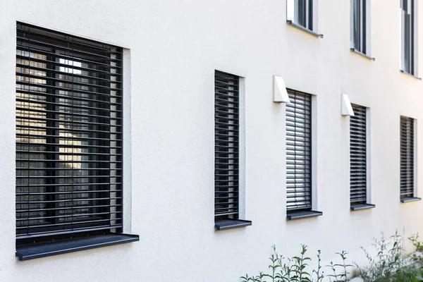 Roller Blind on Modern Windows Outside. External Blinds on windows. Window Roller Blinds Outside. 