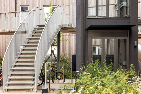 Yard of Modern Apartment Buildings with Outdoors Stairs and Outside Lift. Modern European Residential Yard.