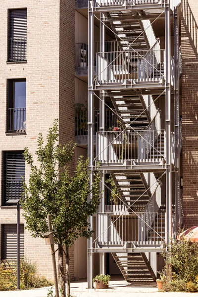 Stairs Outdoors with Stainless steel Handrails, Staircase, Fire Stairs, Fire escape of Modern Facade Building.