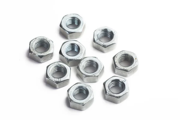 Bright metal nuts — Stock Photo, Image