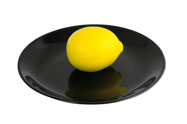 Lemon on a plate — Stock Photo, Image