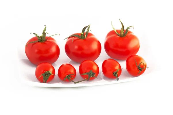 Tomates em uma chapa — Fotografia de Stock