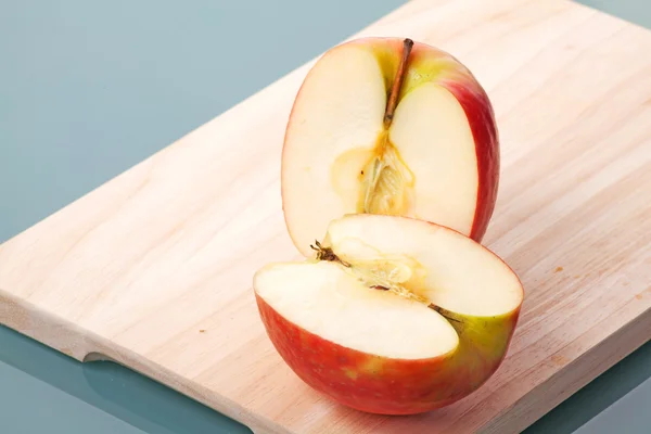 Sliced apple on the desk — Stock Photo, Image
