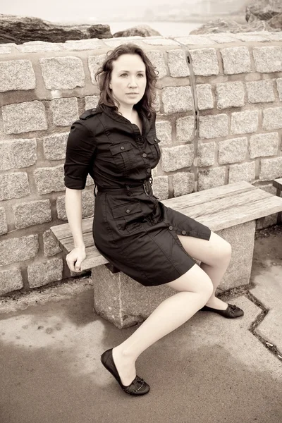 Girl on a bench — Stock Photo, Image