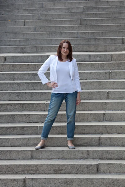 Girl on the stairs — Stock Photo, Image