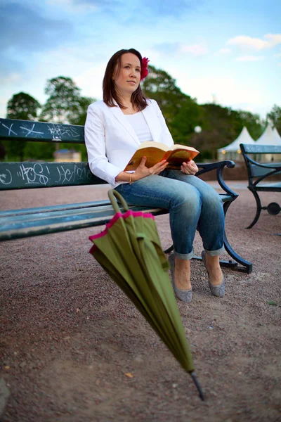 Girl on a bench — Stock Photo, Image