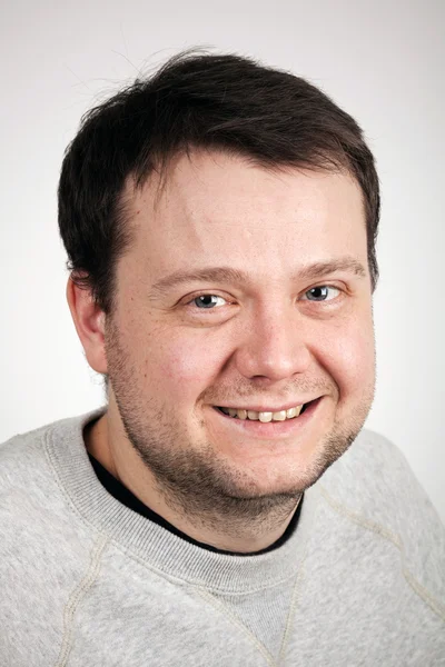 Man on a gray background — Stock Photo, Image