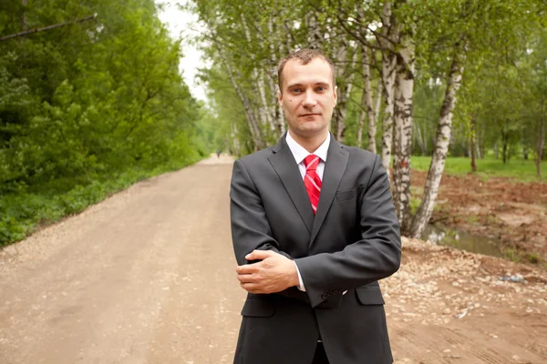 Young businessman at the city park — Stock Photo, Image