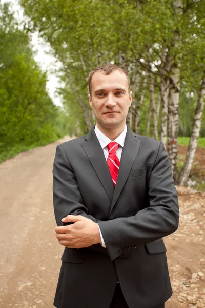 Young businessman at the city park — Stock Photo, Image