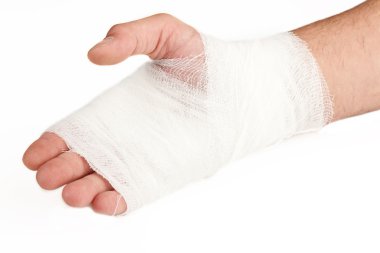 beyaz zemin üzerinde bağlı el bandaj