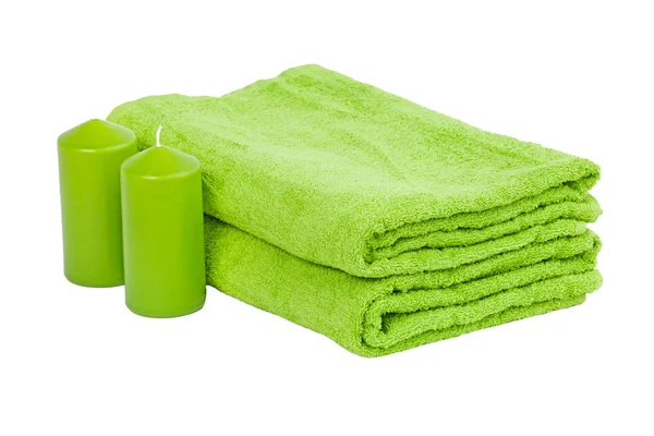 Stack of the green towel with candles — Stock Photo, Image