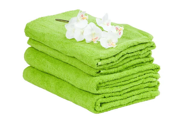 Pila dell'asciugamano verde con fiore — Foto Stock