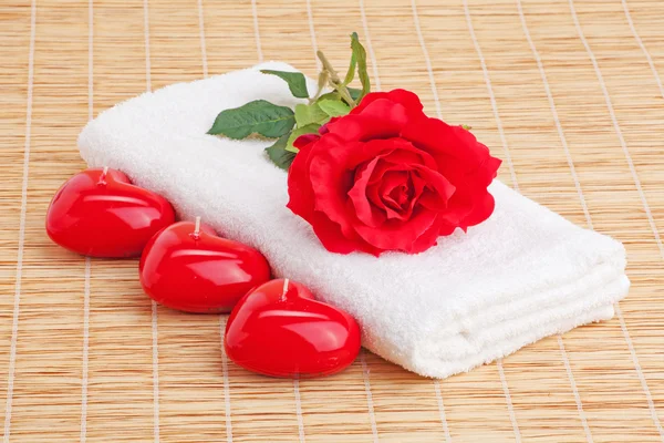 Stack of the towel with red rose and candle heart — Stock Photo, Image