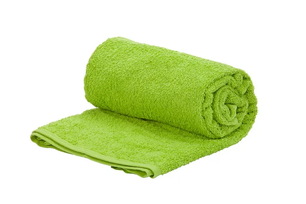 Un rotolo di asciugamano verde su uno sfondo bianco — Foto Stock