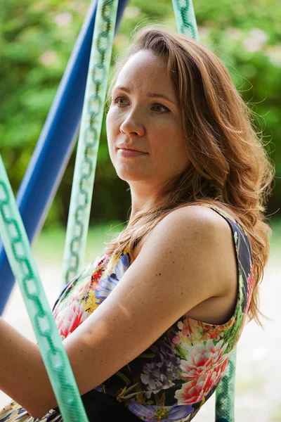 Girl in a city park — Stock Photo, Image