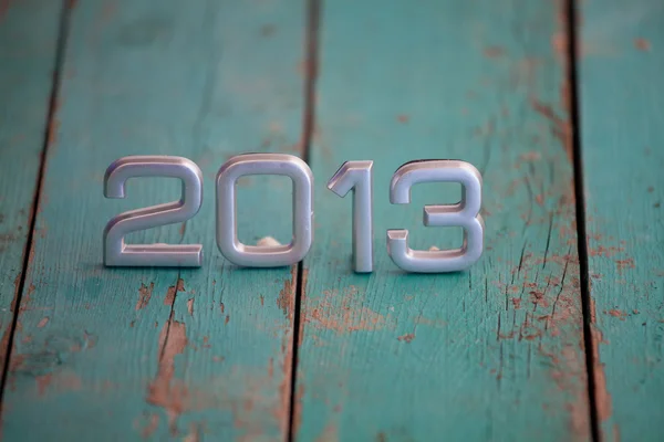 2013 sobre fondo de madera vieja — Foto de Stock