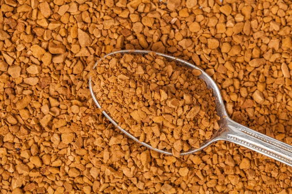 Instant coffee with a teaspoon — Stock Photo, Image