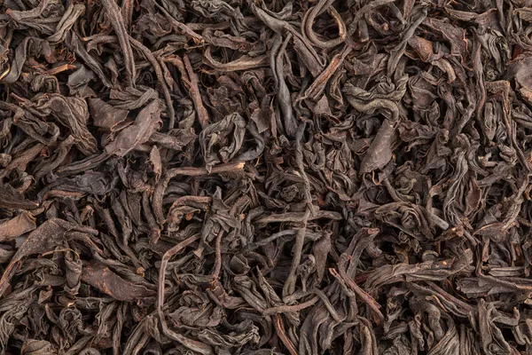 Schwarzer Tee lose getrocknete Teeblätter — Stockfoto