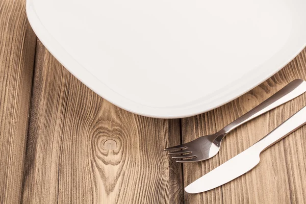 Cuchillo de plato vacío y tenedor — Foto de Stock
