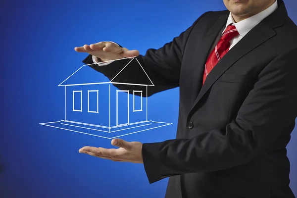 Liikemies piirretty yksinkertainen talo — kuvapankkivalokuva