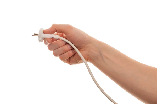 Hand holds Electric plug and long cable. Isolated on a white bac — Stock Photo, Image