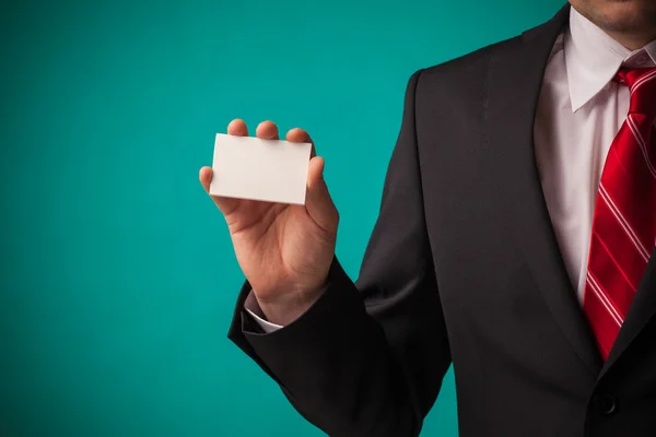 Business man showing empty business card — Stock Photo, Image