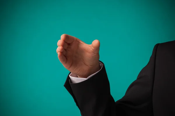 Businessman holding imaginary object — Stock Photo, Image