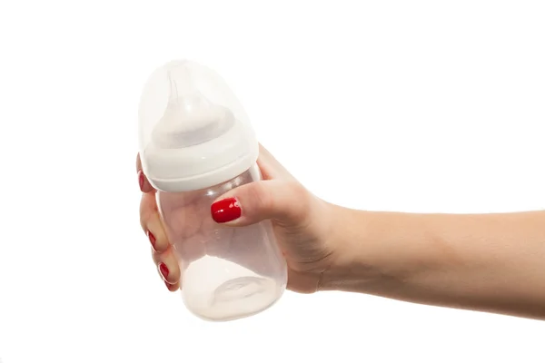 Рука с бутылкой детского питания . — стоковое фото