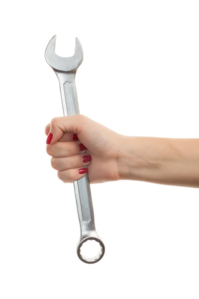 Woman holding chrome vanadium spanner — Stock Photo, Image