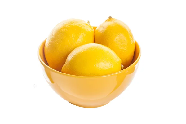 Fresh lemons in a plate — Stock Photo, Image