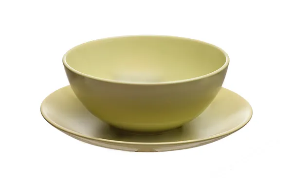 Green ceramic bowl with spoon and plate isolated on white backgr — Stock Photo, Image