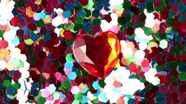 The ruby heart rotates in a circle — Stock Video