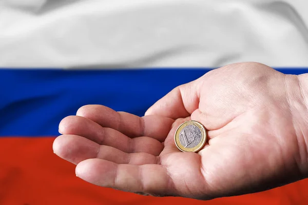Coin One Euro Hand Man Flag Russian Federation Background — ストック写真