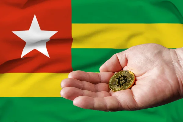 Golden Bitcoin Coin Mans Hand Togo Flag Background — 图库照片