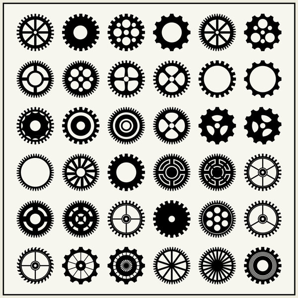 Collection of 36 gear wheels isolated on light background