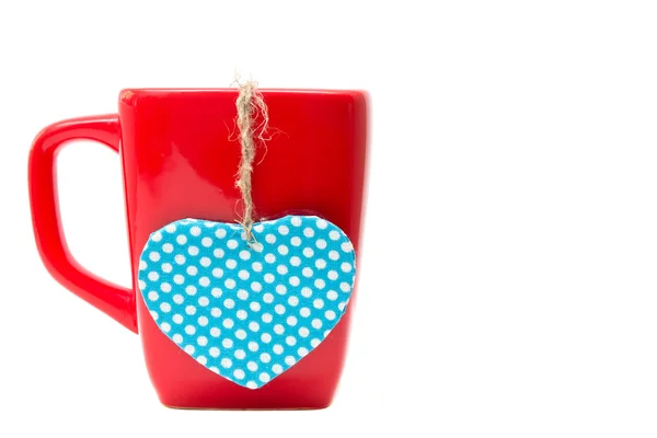 Red mug with heart shape isolated on white background — Stock Photo, Image