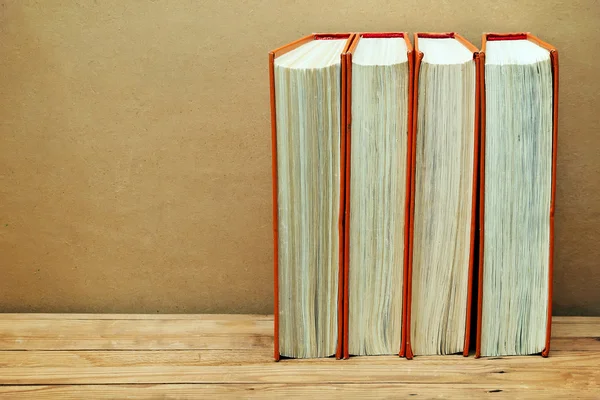 Stack of books in the orange cover — Stock Photo, Image