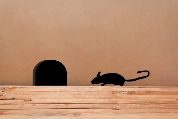 Mouse House in the wall. Silhouette mouse. — Stock Photo, Image