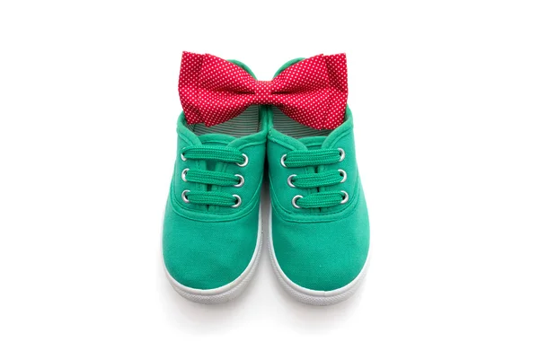 Bow tie and  green sneakers isolated on white — Stock Photo, Image