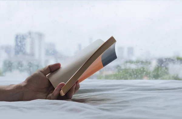 Hand Holding Book Reading Bed Rainy Day Stay Home Relaxing —  Fotos de Stock