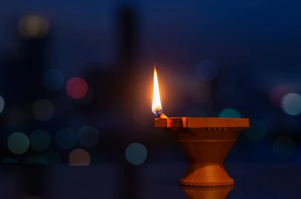 Selective Focus Flame Clay Diya Lamp Colorful City Bokeh Lights — Zdjęcie stockowe