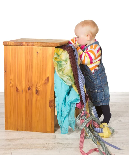 Determined toddler balancing on tiptoe — Stock Photo, Image