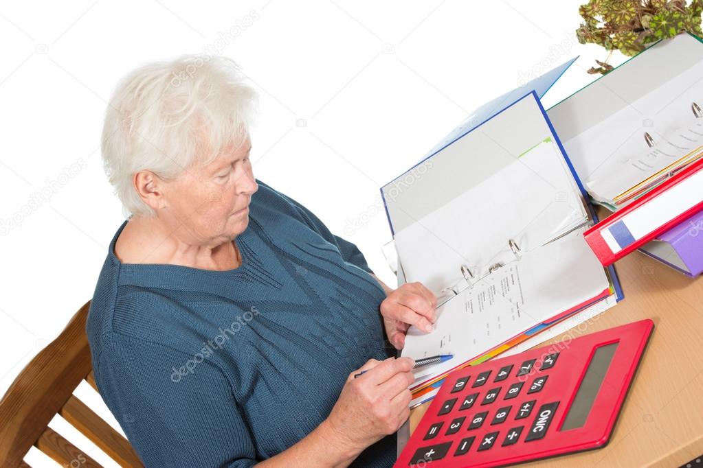 Senior woman doing her accounts